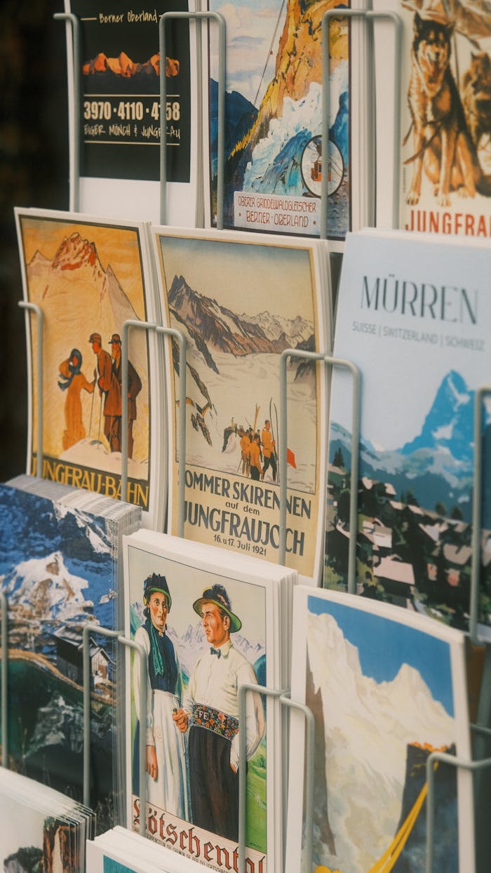 Collection of vintage Swiss travel posters featuring scenic mountains and cultural themes.